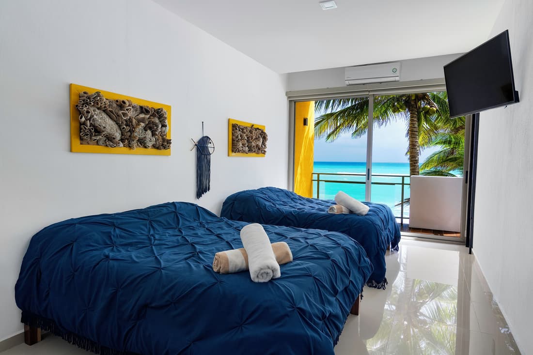 Angelina 28 Beachfront and Family Apartments - Modern and Relaxing Long Stays (20 min from Cancun Airport)