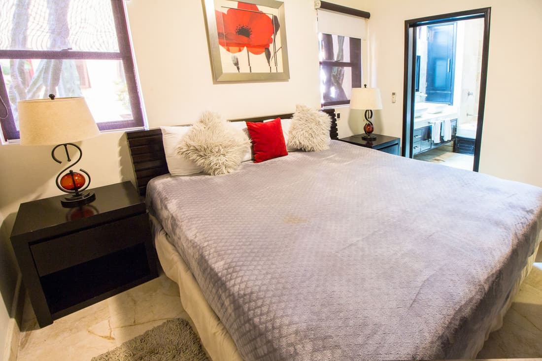 Ground floor, luxury 2 bedroom condo with pool view at El Faro by DPM
