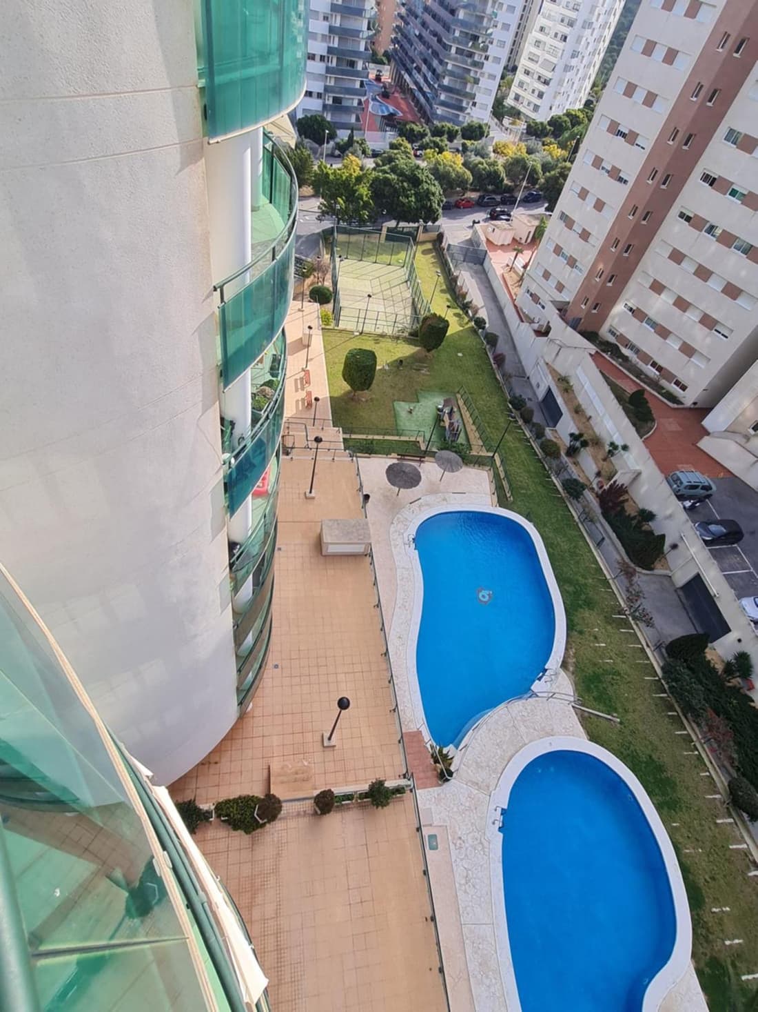 Elegant 2-Bedroom Apartment in Benidorm with Private Pool and Scenic Garden Views
