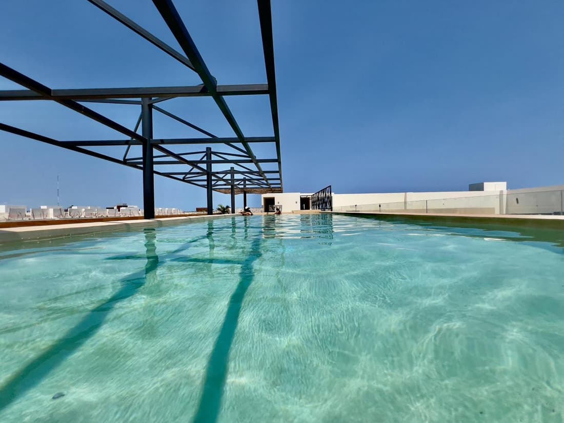 Unwind | Private Balcony & Rooftop Pools | Casago