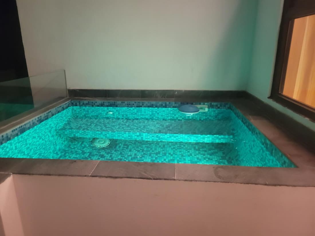 Top level studio with minifridge microwave and splash pool