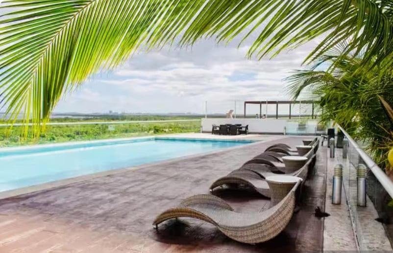 Lovely loft with pool in center!
