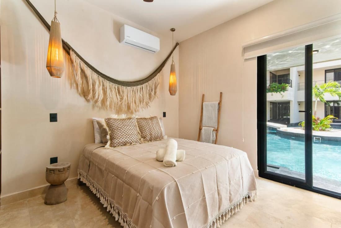 Boho chic 2BR with swim-up pool near the beach