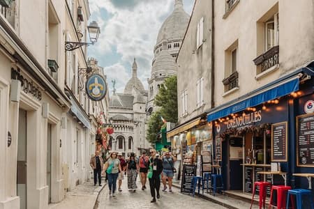 Paris in a Day with Louvre, Eiffel Tower, Notre Dame & Cruise