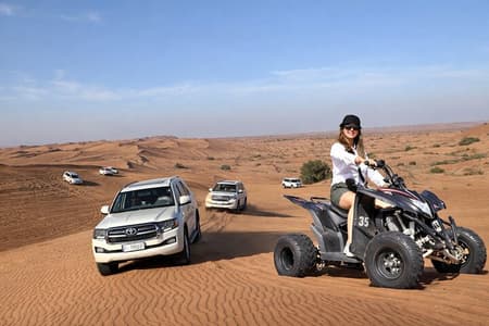 Desert Safari with Quad Bike, BBQ at Premium Camp & Camel Ride