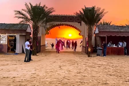 Evening Desert Safari With BBQ Dinner, Camel Ride and Sand Boarding