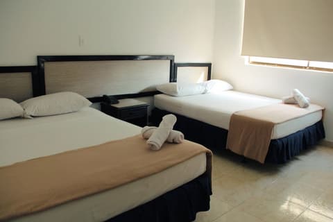 Hotel Axis Inn By GEH Suites