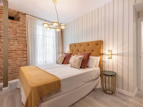 Apartamentos Puerta Elvira Suites 3000