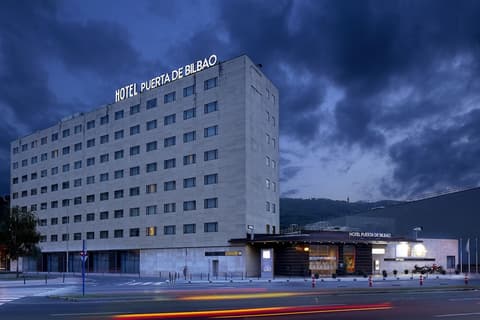Hotel Puerta de Bilbao, Front of property - evening/night