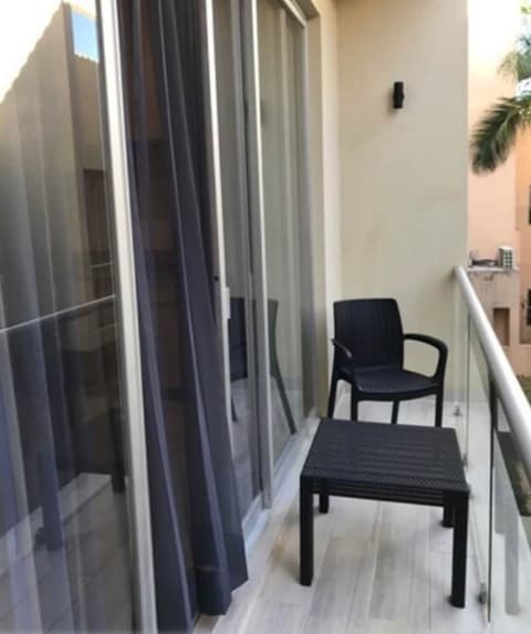 Estudio cerca del mar, en Puerto Aventuras 201, Terrace/patio