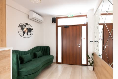 City Plaza Apartments & Rooms