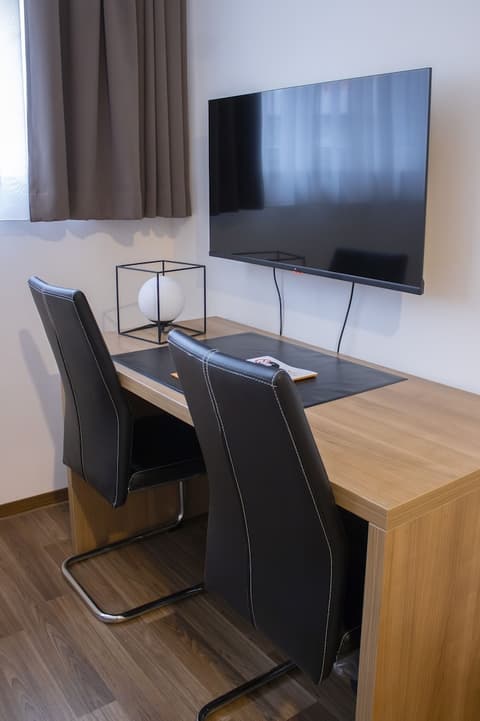 Orange Hotel und Apartments