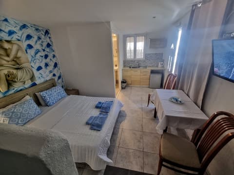 Santorini Studios Pleasure By The Sea