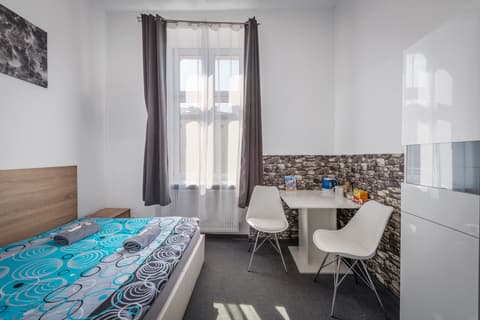 Queen Apartments