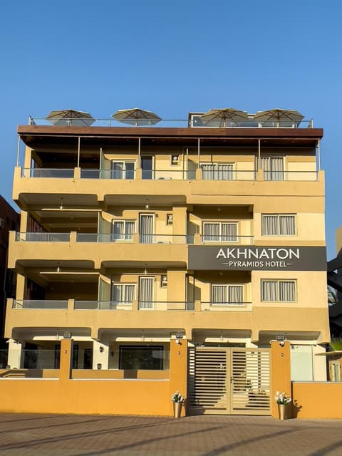AKHNATON Pyramids View Hotel With Rooftop Access & airport pickup