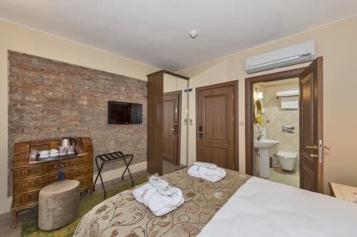 By Murat Royal Hotels, Room