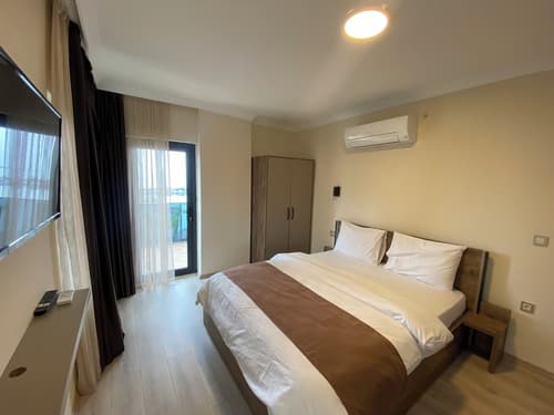Rena Grand Residence & Suite, Room