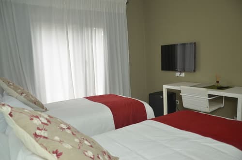 Magno Suites, Room
