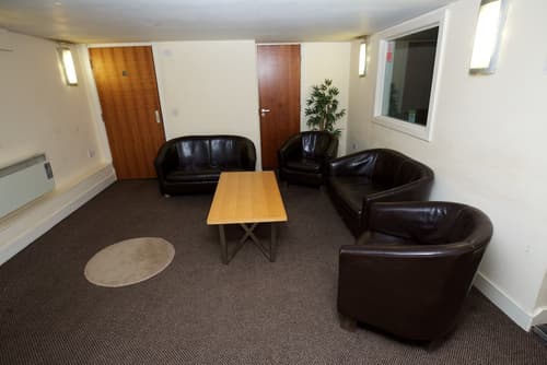 Cocoon at The International Inn, Lobby sitting area