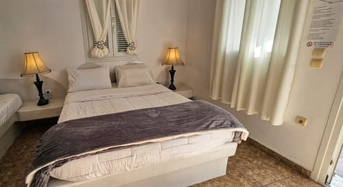 Santorini Studios Pleasure By The Sea