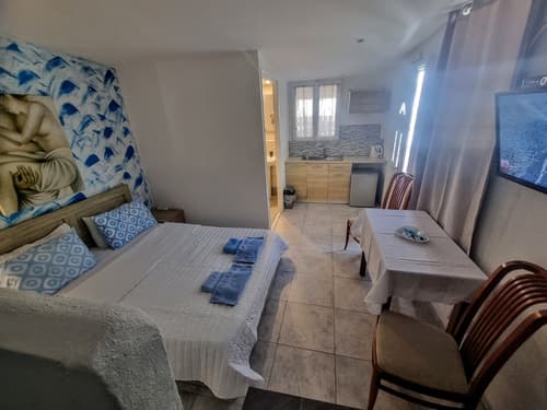 Santorini Studios Pleasure By The Sea