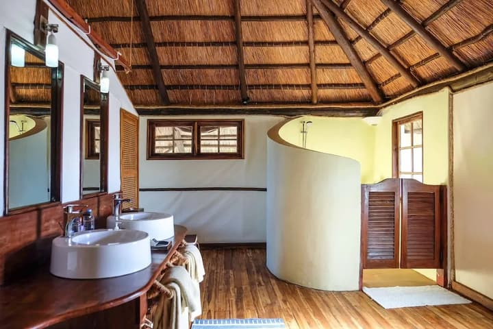 Saadani Safari Lodge - bush, river, beach