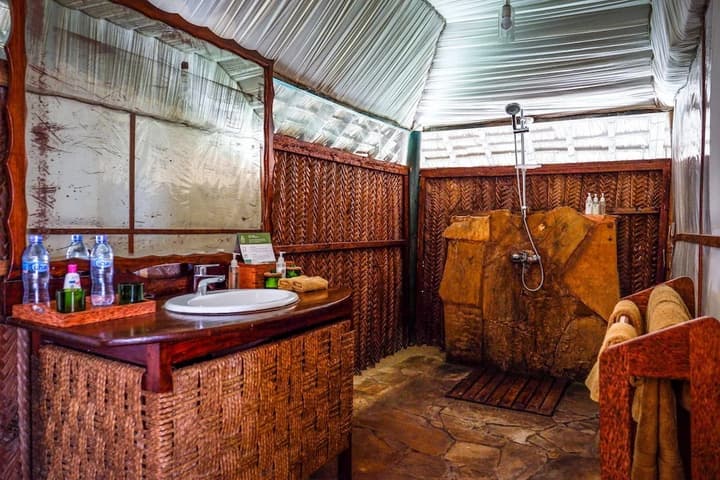 Saadani Safari Lodge - bush, river, beach