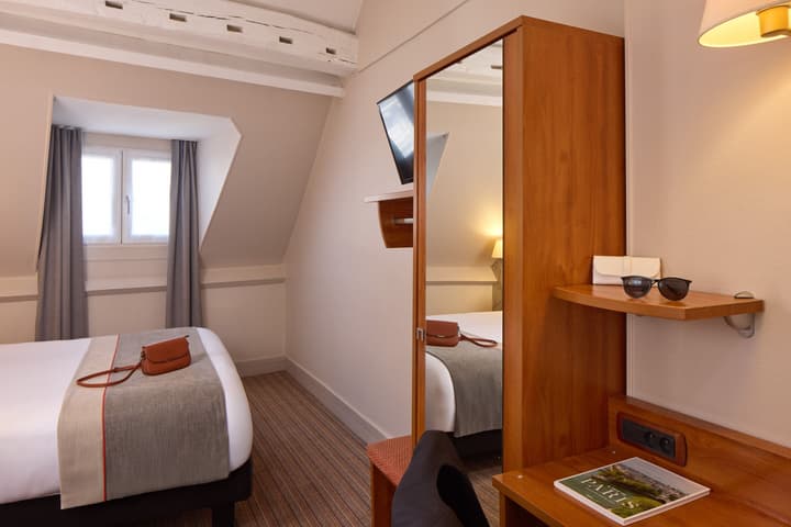 Timhotel Le Louvre