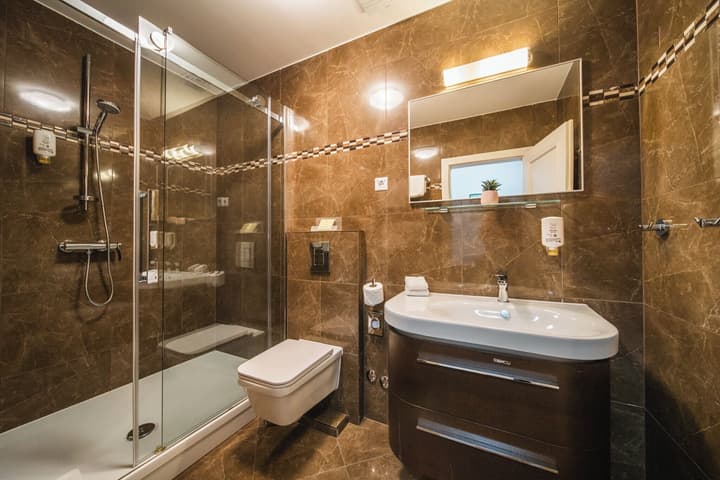 SUNce Palace Apartments offsite parking