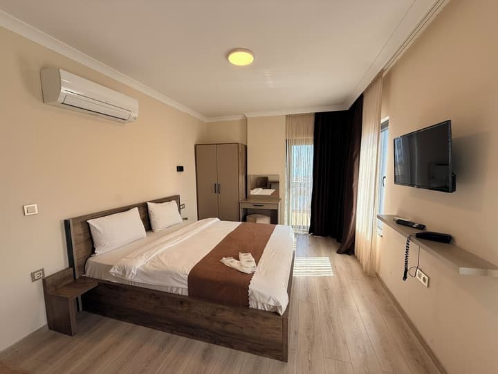 Rena Grand Residence & Suite