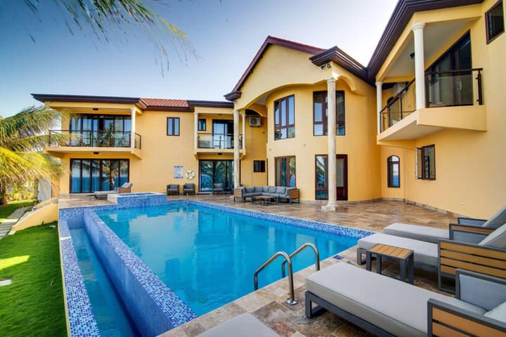 Breathtaking Oceanfront Luxe Villa in Tower Isle Jacuzzi Pool Fully Staffed