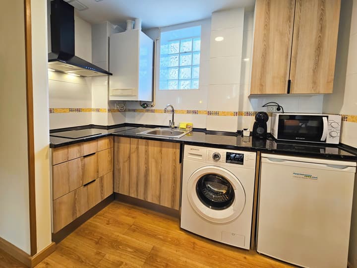 Apartamentos Escarrilla Suites 3000