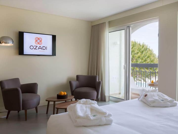Ozadi Tavira Hotel