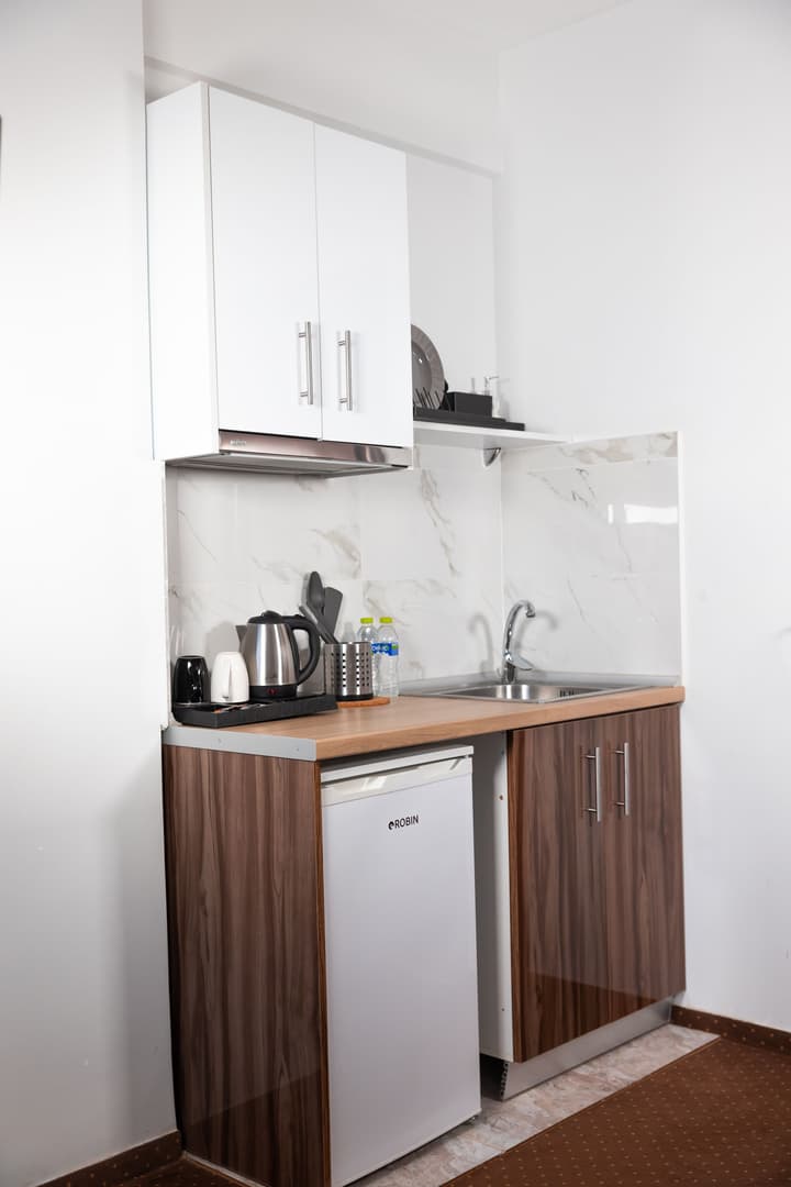 City Plaza Apartments & Rooms