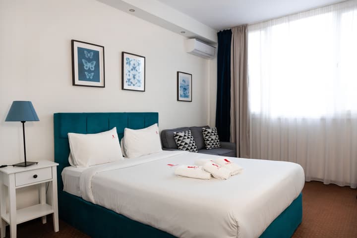 City Plaza Apartments & Rooms