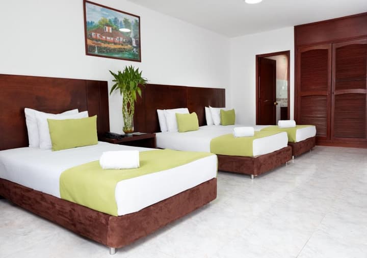 TAMA Hotel Granada Real Cali