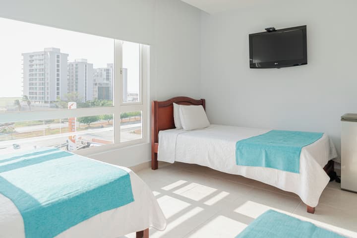 Sanha Plus Hotel