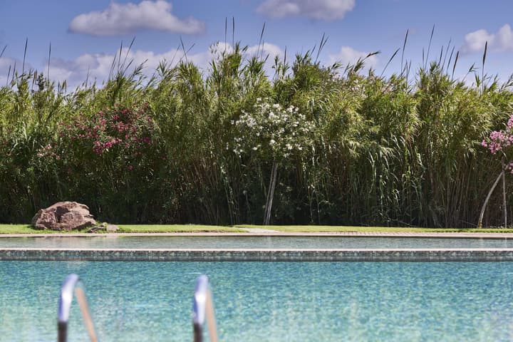 Baia di Chia Resort Sardinia, Curio Collection by Hilton