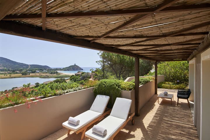 Baia di Chia Resort Sardinia, Curio Collection by Hilton