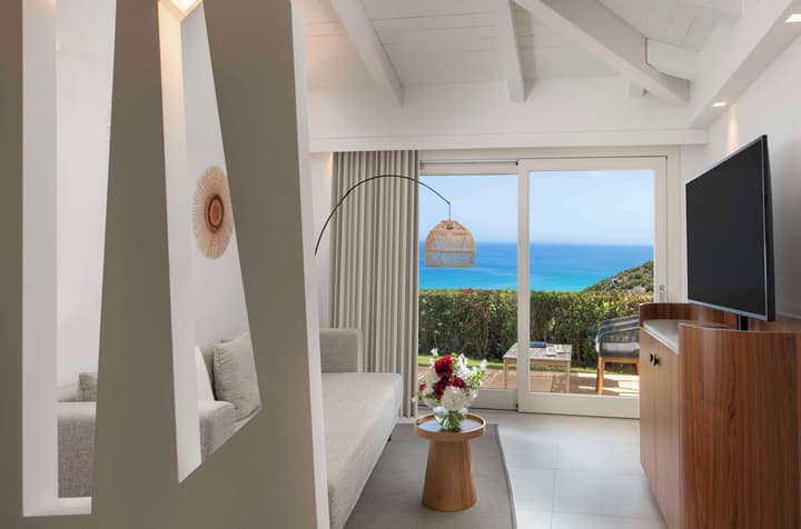 Baia di Chia Resort Sardinia, Curio Collection by Hilton