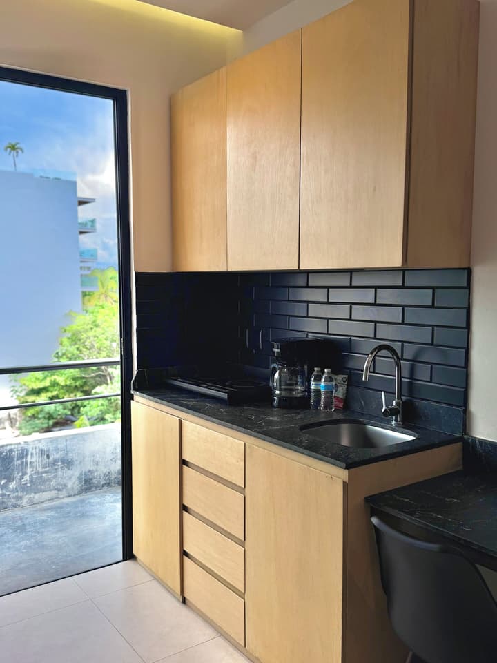 Ah Xok suites 5a Avenida