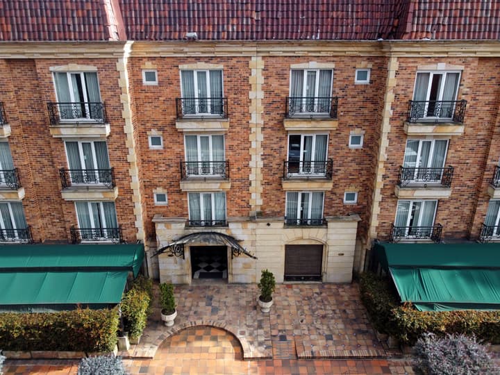 Hotel Windsor House Inn By GEH Suites
