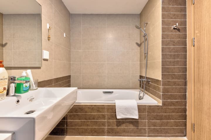 REM Rivergate Garden Pool Signature Apartments
